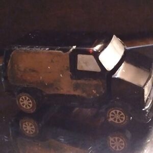 Avon Black and Brown Off-Road Toy Vehicle